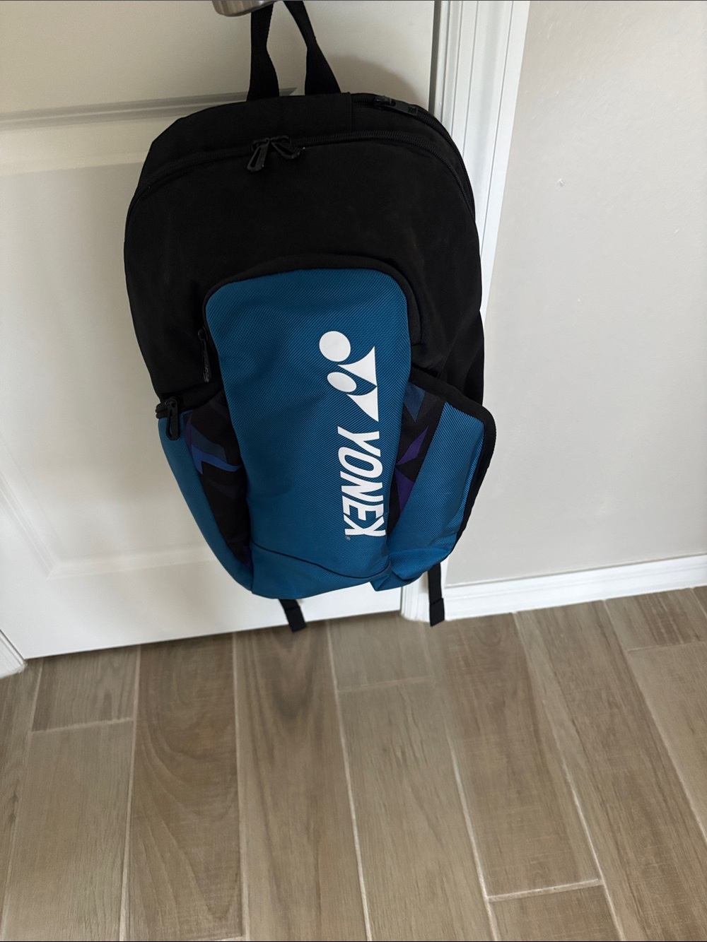 Yonex Black and Blue tennis Bag.  Separate compartment for shoes.